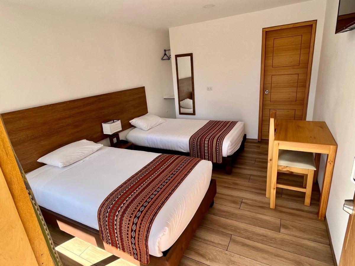 Hotel El Geranio Otavalo Bagian luar foto
